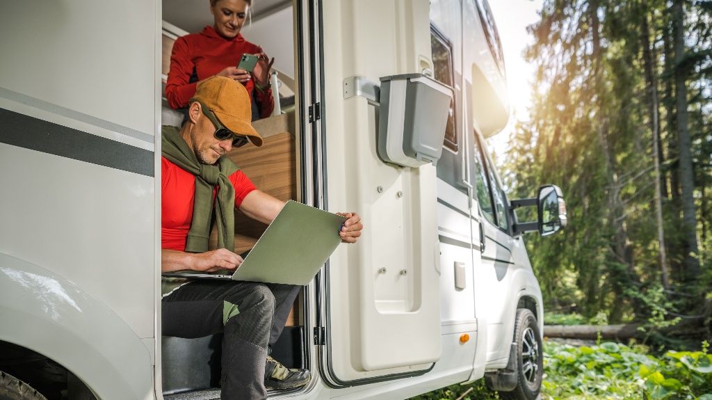 Couple Using Internet While Traveling